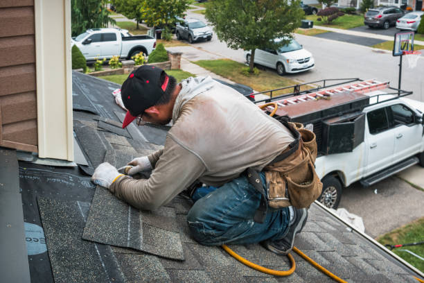 Professional Roofing technician working in Fall River, MA